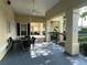 Covered patio area with black furniture at 4008 San Gallo Dr # 106, Kissimmee, FL 34741