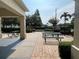 Community picnic area with picnic tables and shade at 4008 San Gallo Dr # 106, Kissimmee, FL 34741