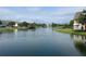 Scenic view of a community pond with fountain and docks at 4008 San Gallo Dr # 106, Kissimmee, FL 34741