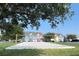 Community sand volleyball court surrounded by lush green lawns at 4008 San Gallo Dr # 106, Kissimmee, FL 34741