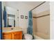 Bathroom with a tile shower, and wood vanity at 4017 Dijon Dr # 4017K, Orlando, FL 32808