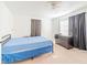 The bedroom has neutral carpet, bright natural light, and a large closet at 4017 Dijon Dr # 4017K, Orlando, FL 32808