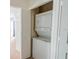 Convenient in-unit stacked washer and dryer in the laundry closet at 4017 Dijon Dr # 4017K, Orlando, FL 32808
