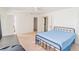 Bright main bedroom with a ceiling fan, neutral carpet, and walk-in closet at 4017 Dijon Dr # 4017K, Orlando, FL 32808