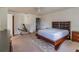 Spacious main bedroom with a large bed, sitting area, and ensuite bathroom at 4017 Dijon Dr # 4017K, Orlando, FL 32808