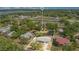 Aerial view of the property within neighborhood; close to community assets like tennis and lake access at 416 E Seminole Ave, Lake Wales, FL 33853