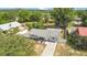 Aerial view of the property and surrounding neighborhood, showing the well-maintained lawn and landscaping at 416 E Seminole Ave, Lake Wales, FL 33853