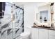 Modern bathroom with stylish glass shower, vanity with LED mirror, and sleek fixtures at 416 E Seminole Ave, Lake Wales, FL 33853
