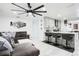 Spacious living room area featuring a modern bar, stylish decor, and seamlessly blending with an updated kitchen at 416 E Seminole Ave, Lake Wales, FL 33853