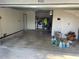 Spacious garage featuring laundry facilities and ample storage space, blending utility with functionality at 4926 Reginald Rd, Orlando, FL 32829