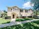 Charming two-story townhome with well-maintained landscaping, offering a welcoming curb appeal at 5356 Diplomat Ct # 108, Kissimmee, FL 34746