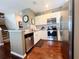 Modern kitchen with stainless steel appliances, granite countertops, and white cabinetry at 5356 Diplomat Ct # 108, Kissimmee, FL 34746