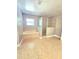 Bathroom with a soaking tub and a tiled glass shower and tile flooring under natural light at 5704 Ansley Way, Mount Dora, FL 32757