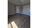 This bedroom features wood-style floors, a ceiling fan, and a closet at 5704 Ansley Way, Mount Dora, FL 32757