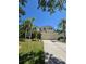 Charming two-story home with a well manicured lawn and beautiful landscaping at 5704 Ansley Way, Mount Dora, FL 32757