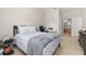 Bedroom featuring neutral walls, tile floors, and a desk at 6214 Stevenson Dr # 106, Orlando, FL 32835