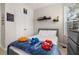Bedroom featuring double door closet, tile flooring and window at 6214 Stevenson Dr # 106, Orlando, FL 32835