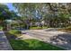 Elegant gated entrance to the community, showcasing manicured landscaping and secure access at 6214 Stevenson Dr # 106, Orlando, FL 32835