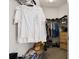 Walk-in closet with shelves, rods, and storage spaces for an organized wardrobe at 7144 Five Oaks Dr, Harmony, FL 34773