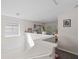 Upstairs loft area, featuring natural light and space for multiple uses at 7144 Five Oaks Dr, Harmony, FL 34773