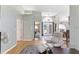 Spacious entryway featuring light wood floors and seamless access to multiple living areas at 7222 Stanford Dr, Lakeland, FL 33809