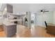 Modern kitchen with stainless appliances, sleek cabinets, ample counter space, and open layout to living areas at 7222 Stanford Dr, Lakeland, FL 33809