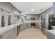 This modern kitchen is equipped with stainless steel appliances, sleek cabinetry, and ample counter space at 7222 Stanford Dr, Lakeland, FL 33809