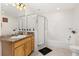 Bright and airy bathroom with modern fixtures, tub, shower, and a spacious vanity at 9055 Treasure Trove Ln # 409, Kissimmee, FL 34747