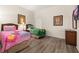 Charming bedroom with twin beds, whimsical decor, and a comfortable ambiance for children at 9055 Treasure Trove Ln # 409, Kissimmee, FL 34747