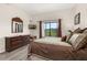 Bright and spacious main bedroom with great views, functional furniture, and stylish decor at 9055 Treasure Trove Ln # 409, Kissimmee, FL 34747