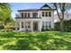 Charming two-story home with a balcony overlooking the well-maintained lawn, perfect for outdoor enjoyment at 9799 Covent Garden Dr, Orlando, FL 32827