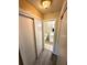 This bathroom features a toilet, a sink and a large closet space for storage at 1001 Plantation Dr # E1, Kissimmee, FL 34741