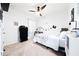 Cozy bedroom with neutral carpet, ceiling fan, and lots of natural light at 1015 Andean Ln, Davenport, FL 33837