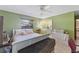 Bedroom with attached bathroom and decorative mirror above vanity area at 1096 Dyson Dr, Winter Springs, FL 32708