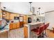 Kitchen features modern appliances and a breakfast bar with seating at 1096 Dyson Dr, Winter Springs, FL 32708