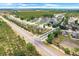 Expansive aerial view of a community featuring well-maintained homes, lush landscaping, and neighborhood streets at 1096 Roberta Rd, Lake Wales, FL 33853