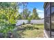 Spacious backyard featuring lush greenery, a privacy fence, and a relaxing outdoor space at 1096 Roberta Rd, Lake Wales, FL 33853