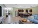 Spacious living area featuring an open floor plan, stainless steel appliances, and modern finishes at 1096 Roberta Rd, Lake Wales, FL 33853