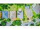 Beautiful neighborhood with well-maintained homes, green lawns, and mature trees at 12715 Moss Park Ridge Dr, Orlando, FL 32832