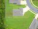 A top down aerial shot of a house with dark roof and green grass surrounding it at 1278 Asher Mason Ave, Kissimmee, FL 34744