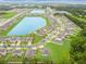 A beautiful view of this lakeside neighborhood with mature trees and well kept lawns at 1278 Asher Mason Ave, Kissimmee, FL 34744