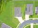 A top down aerial shot of a house with dark roof and green grass surrounding it at 1278 Asher Mason Ave, Kissimmee, FL 34744