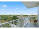 Balcony with a scenic view and outdoor seating at 13415 Blue Heron Beach Dr # 401, Orlando, FL 32821