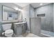 Modern bathroom featuring a walk-in shower, vanity, and neutral tones at 13415 Blue Heron Beach Dr # 401, Orlando, FL 32821