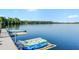 Dockside with kayaks, offering direct access to the tranquil lake waters at 13415 Blue Heron Beach Dr # 401, Orlando, FL 32821