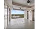 Well lit elevator lobby with ceiling fans, elevator access, and beautiful views from the balcony at 13415 Blue Heron Beach Dr # 401, Orlando, FL 32821