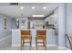 Well-equipped kitchen with stainless steel appliances and a breakfast bar, perfect for casual dining at 13415 Blue Heron Beach Dr # 401, Orlando, FL 32821