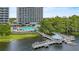 Aerial view featuring a pool, gazebo, and condo building at 13415 Blue Heron Beach Dr # 401, Orlando, FL 32821