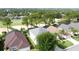 This home's backyard faces a golf course and offers a tranquil outdoor space at 1426 Park Park, Haines City, FL 33844