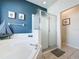 This bathroom has a bathtub with tiled walls and a glass-enclosed shower for added convenience at 1426 Park Park, Haines City, FL 33844